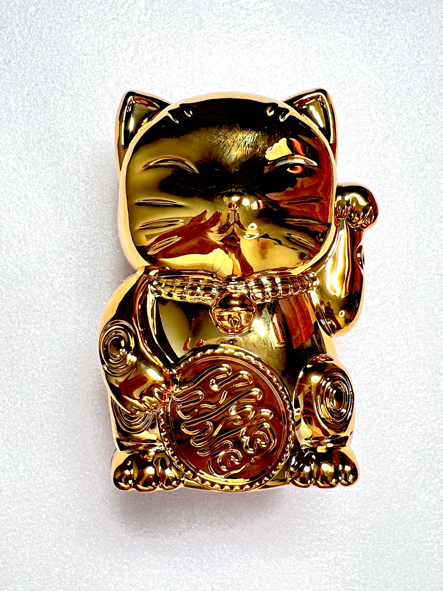 golden plastic toy like magic 8 ball