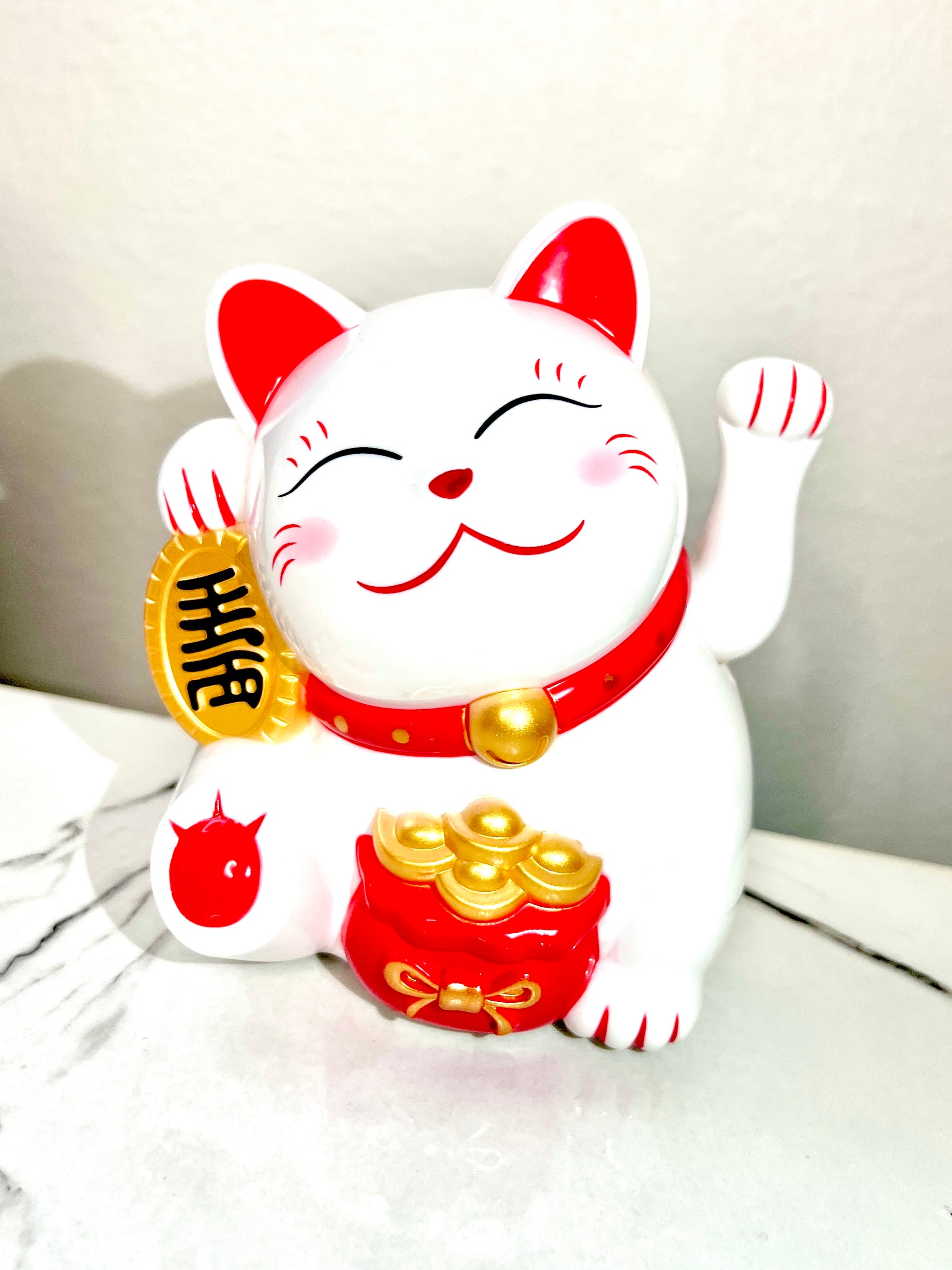 Maneki Neko cat good luck and fortune charm for business and houses to attract money