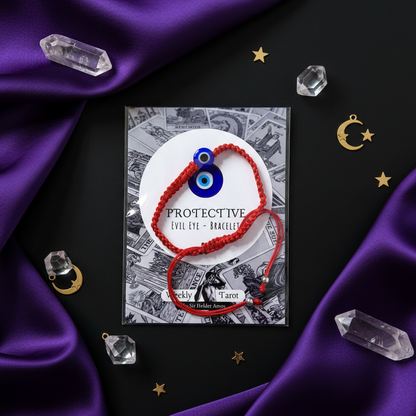 Red El Eye Bracelet on a purple silk with crystals quartz 