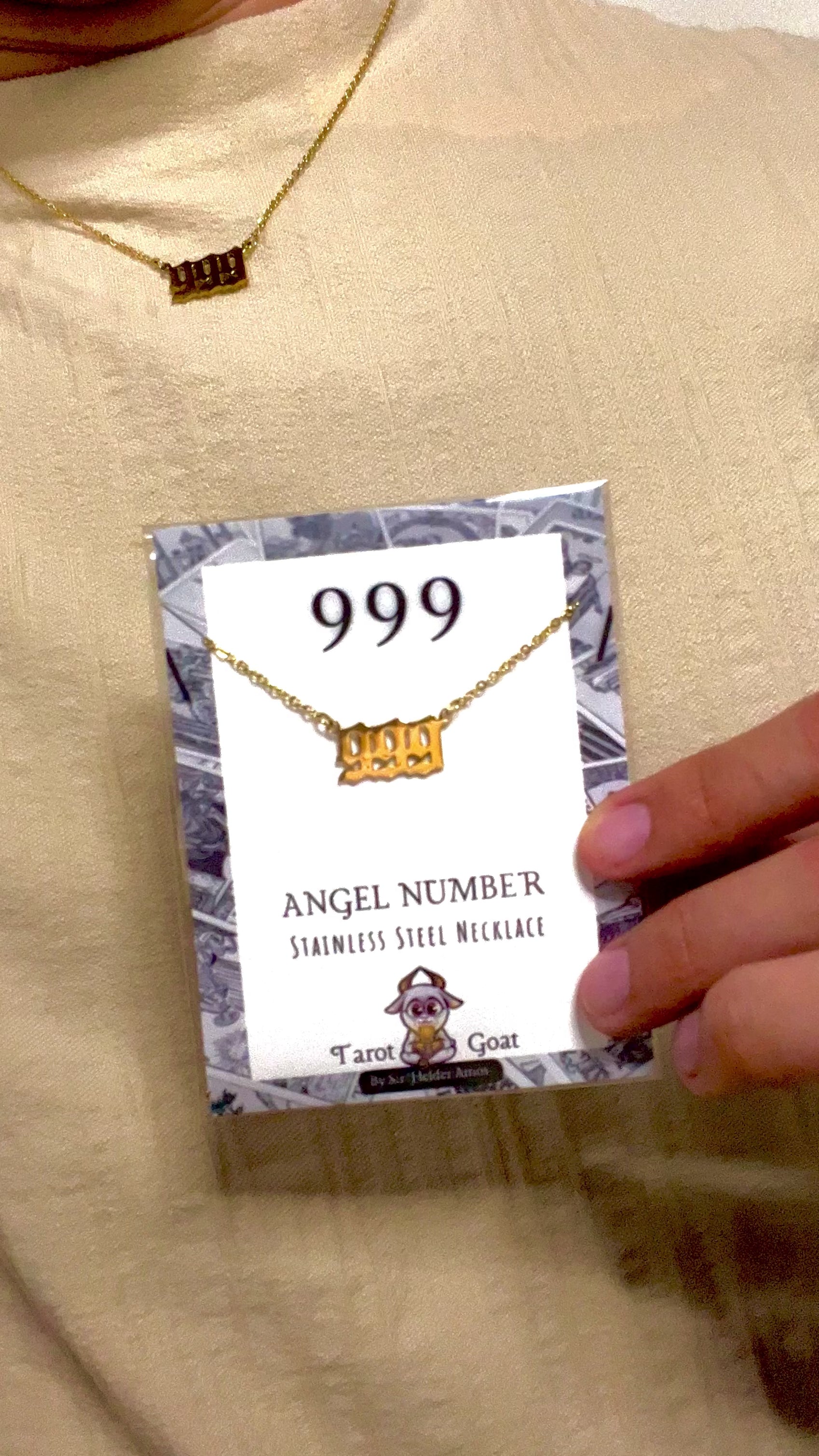 model wearing a 999 angel number necklace from tiktok shop viral necklace 