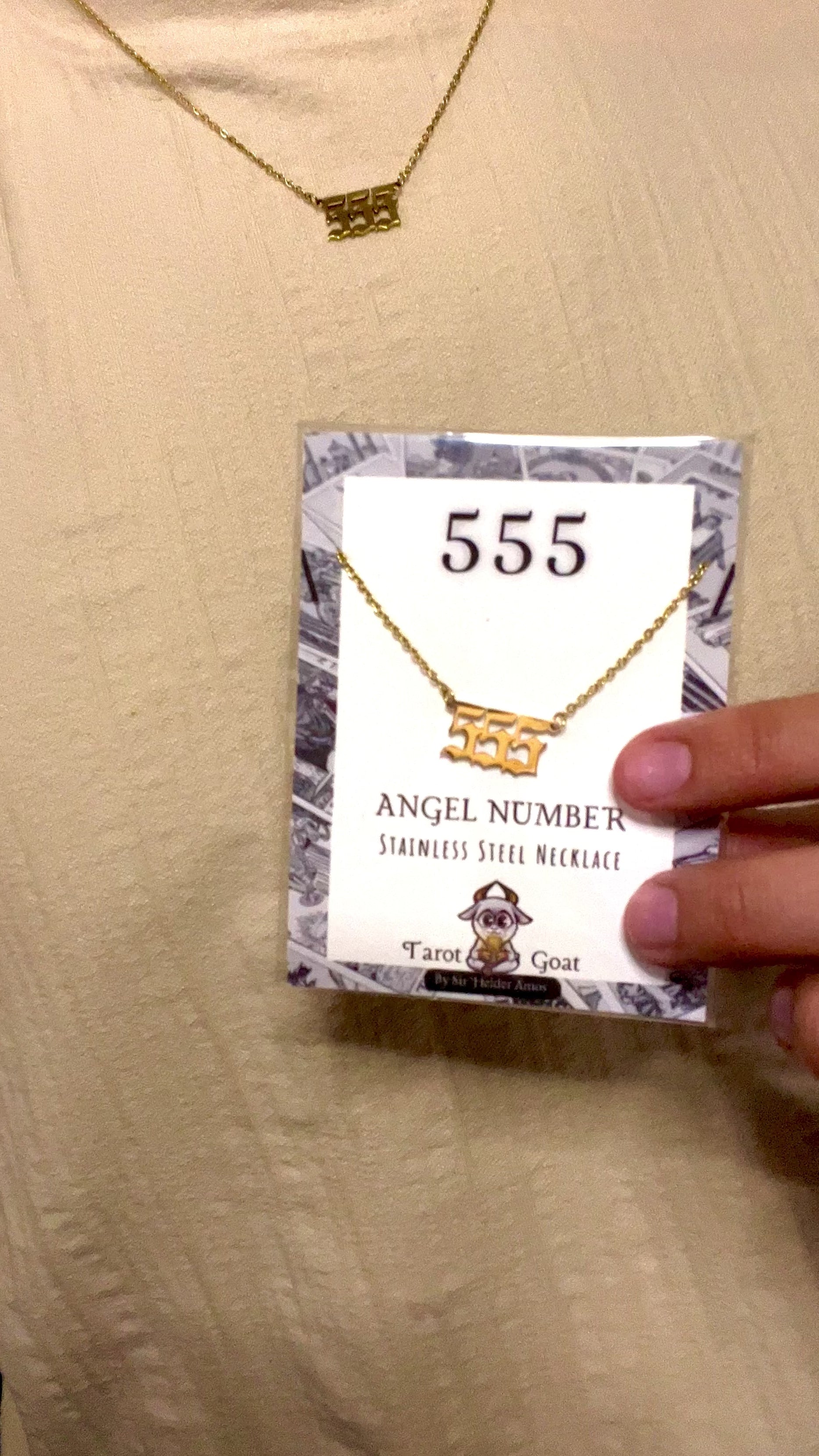 Model wearing a 555 angel numver tiktok necklace for sale online shopping