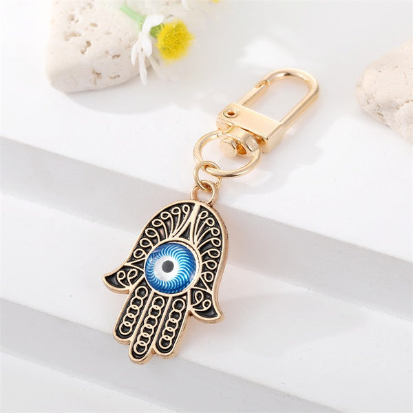 Golden and Black Hamsa Hand Evil Eye Keychain